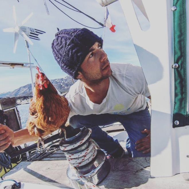 This guy sails around the world with his pet chicken.