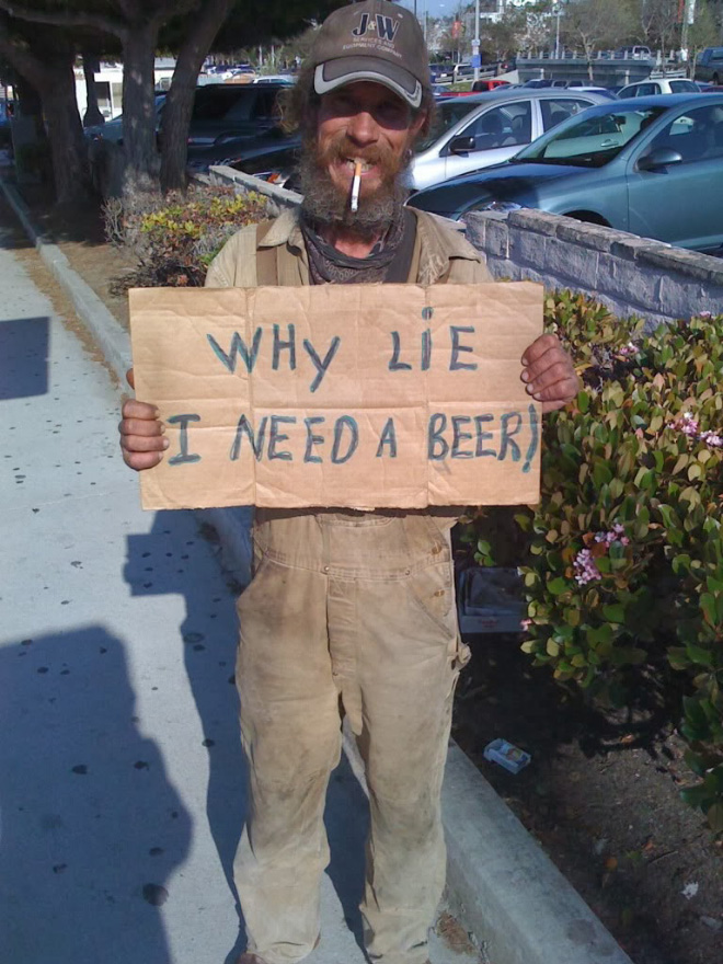 Funny panhandler sign.