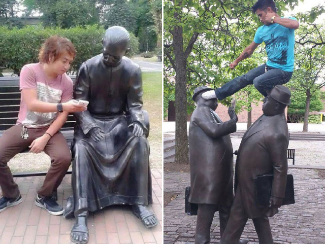 Having fun with statues.