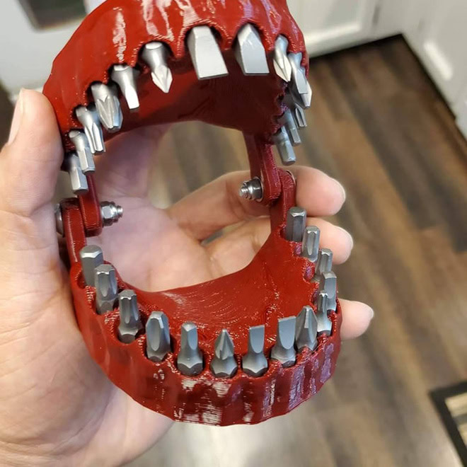 3D printed denture drill bit holder.